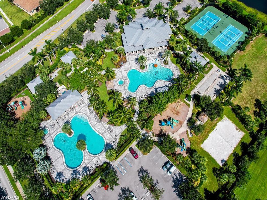 2265 Avocado Lane Naples, FL 34102 - Photo 31 of 32 an aerial view of a flower garden