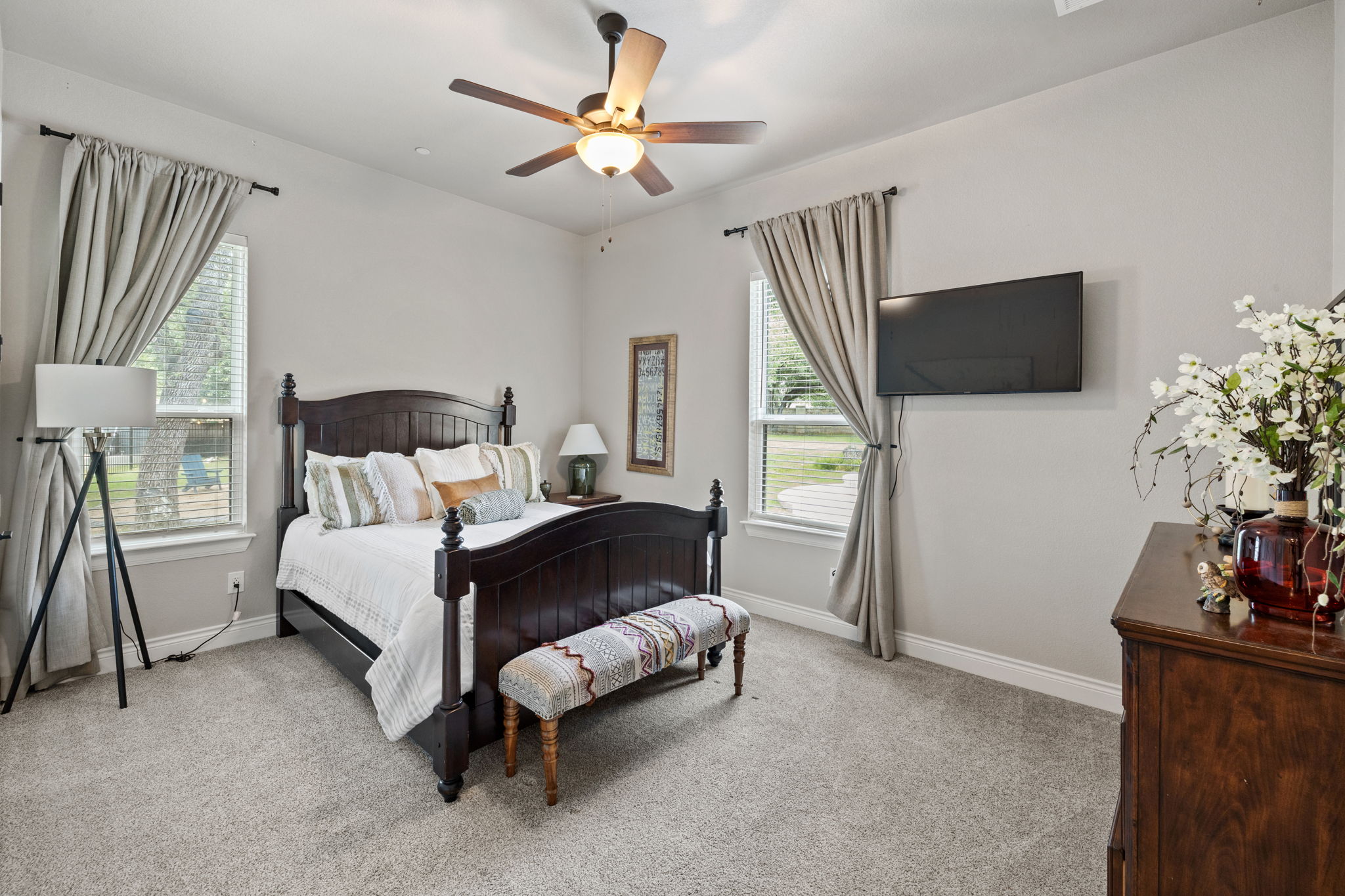 104 Lower Cedar Cove Georgetown, TX 78633 - Photo 21 of 37 a bedroom with furniture and a flat screen tv