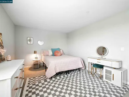 a en suite bathroom with a sink and a mirror