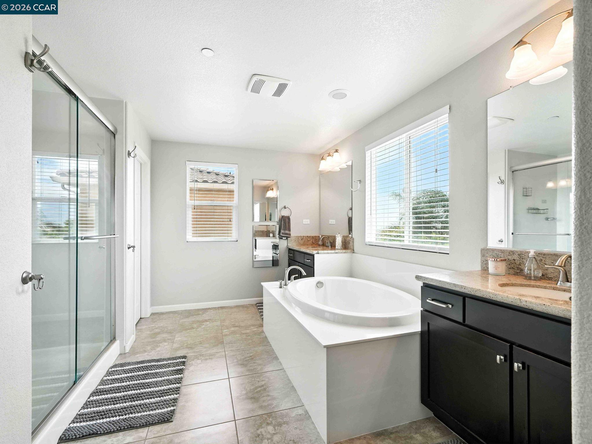 2433 Sanders Lane Fairfield, CA 94533 - Photo 35 of 51 a bathroom with a sink and a bathtub