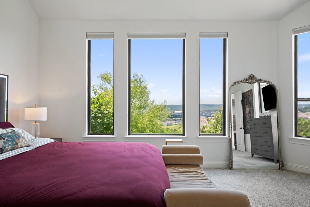 1221 Siena Sunset Road Leander, TX 78641 - Photo 20 of 39 Multiple expansive windows with roller shades