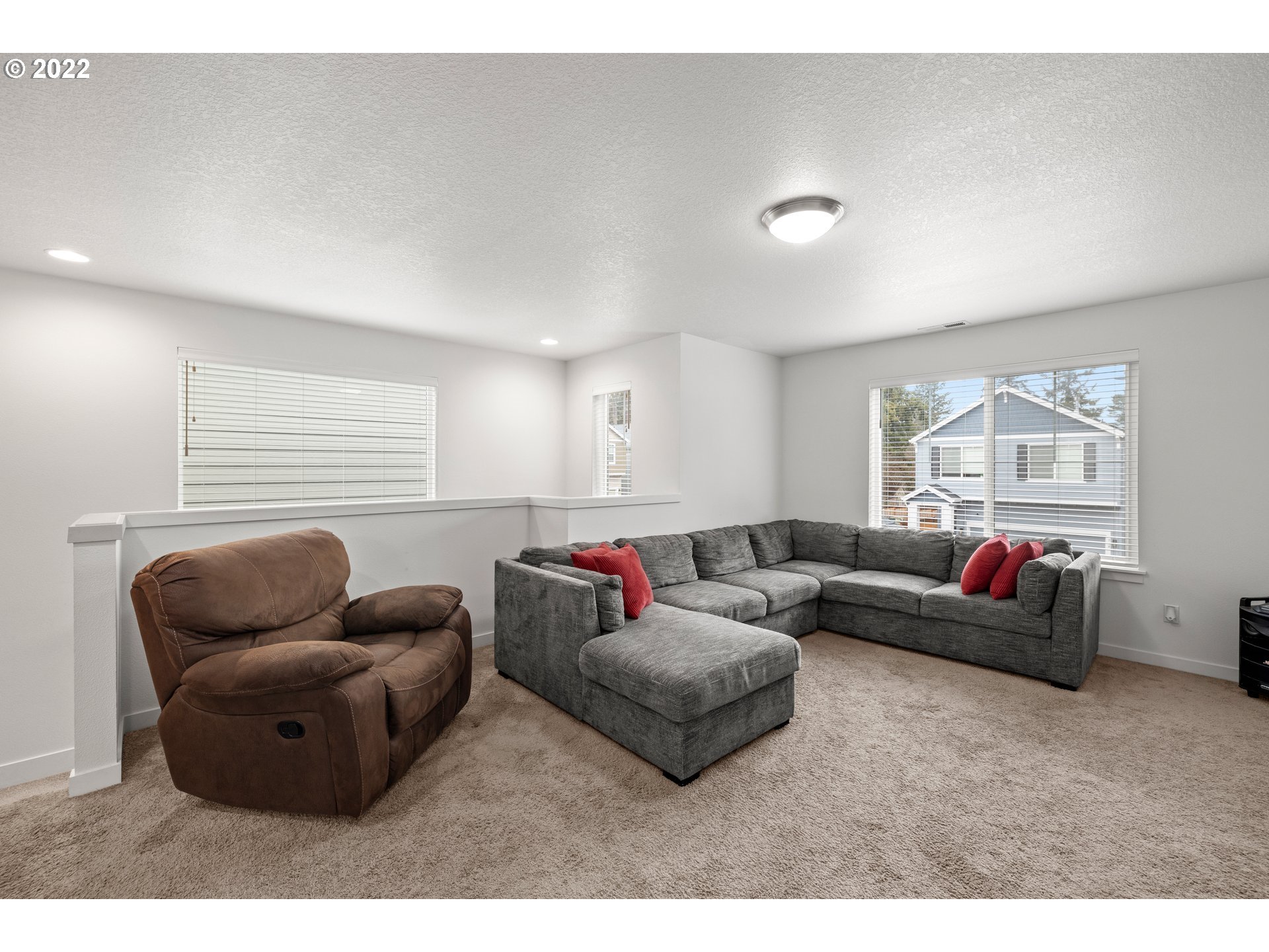 951 Southwest Draper Terrace Beaverton, OR 97003 - Photo 12 of 32 a living room with furniture and a window