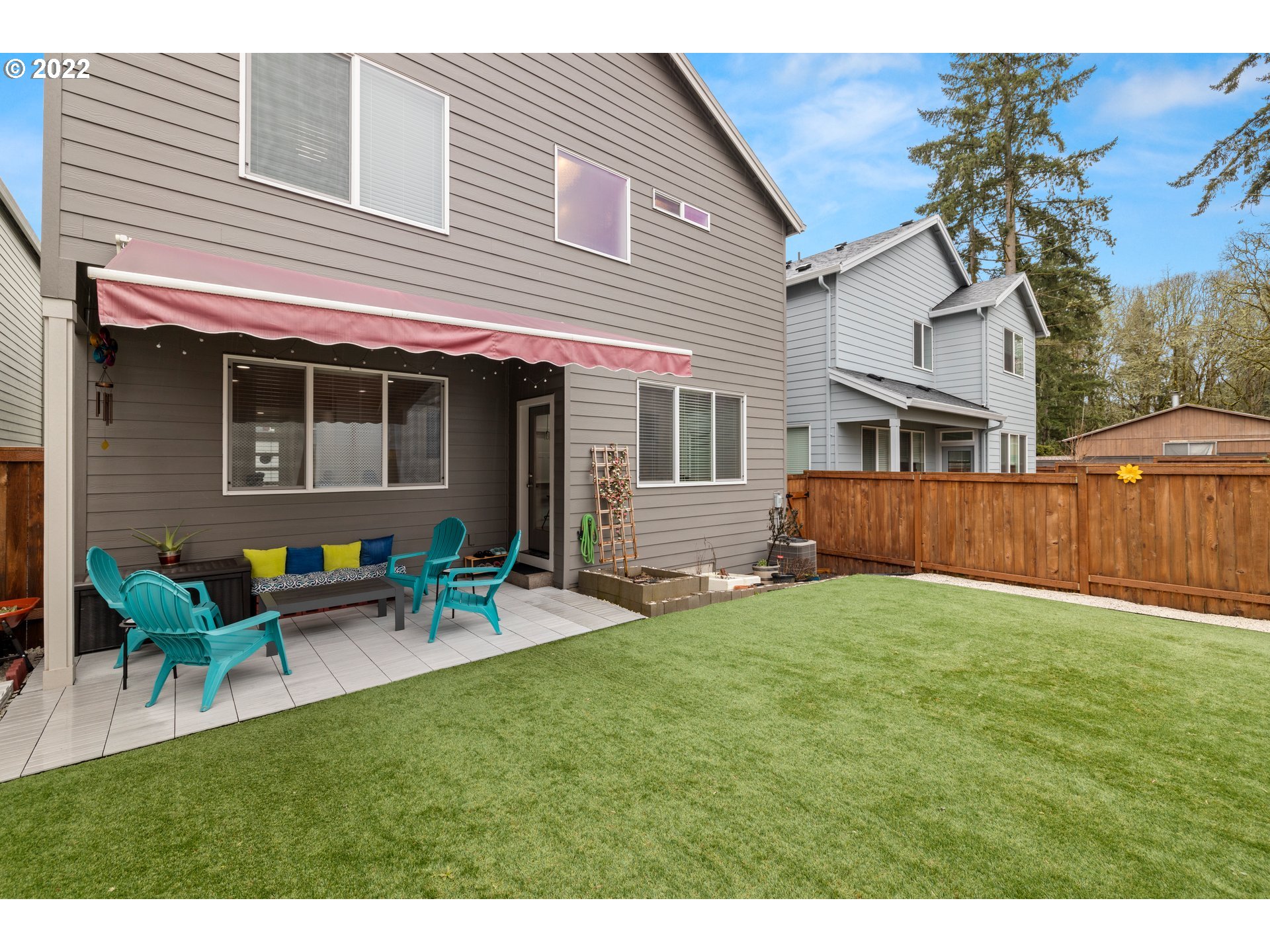 951 Southwest Draper Terrace Beaverton, OR 97003 - Photo 29 of 32 a view of a house with a backyard and chairs
