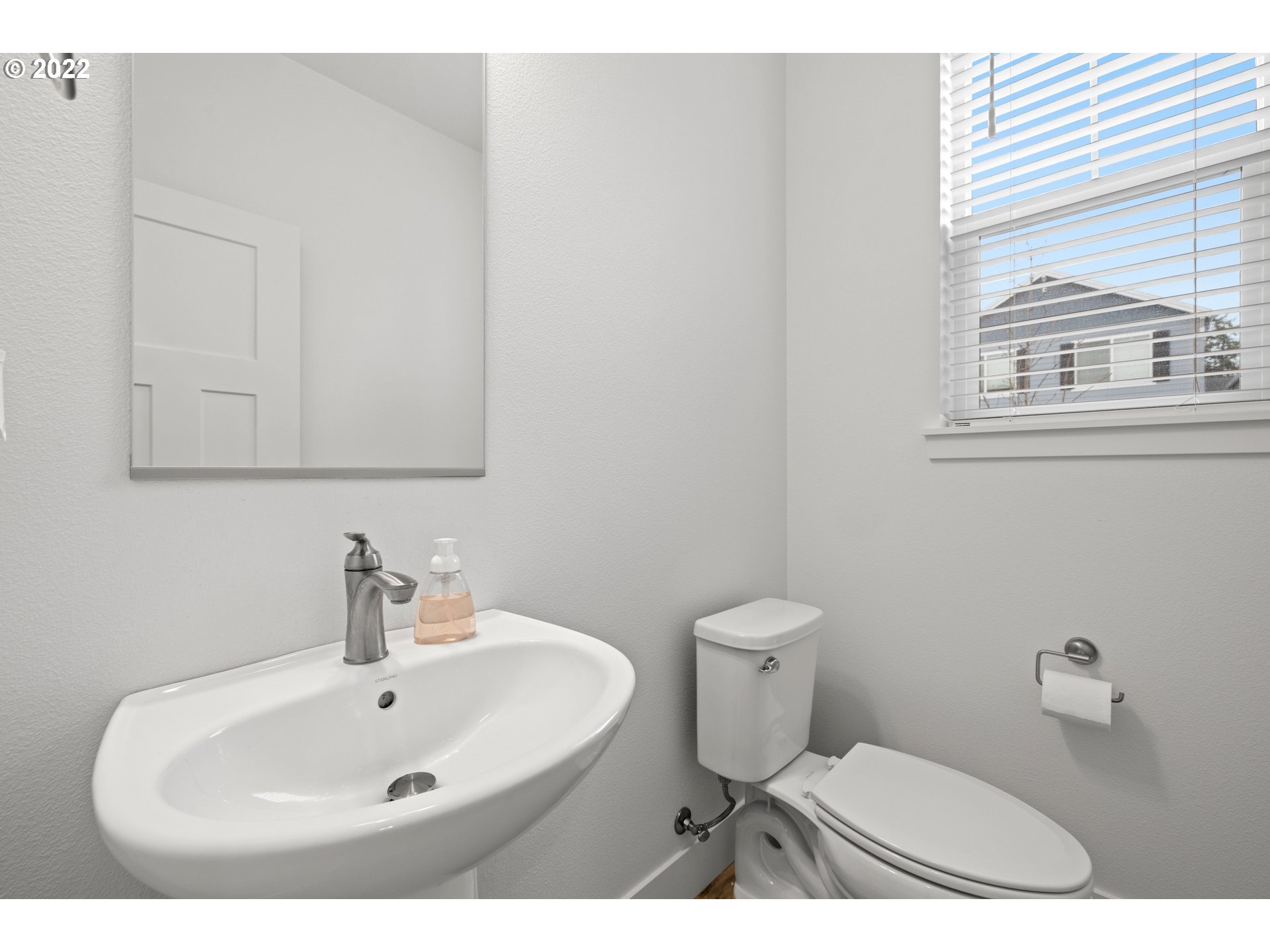 951 Southwest Draper Terrace Beaverton, OR 97003 - Photo 3 of 32 a bathroom with a sink and a toilet