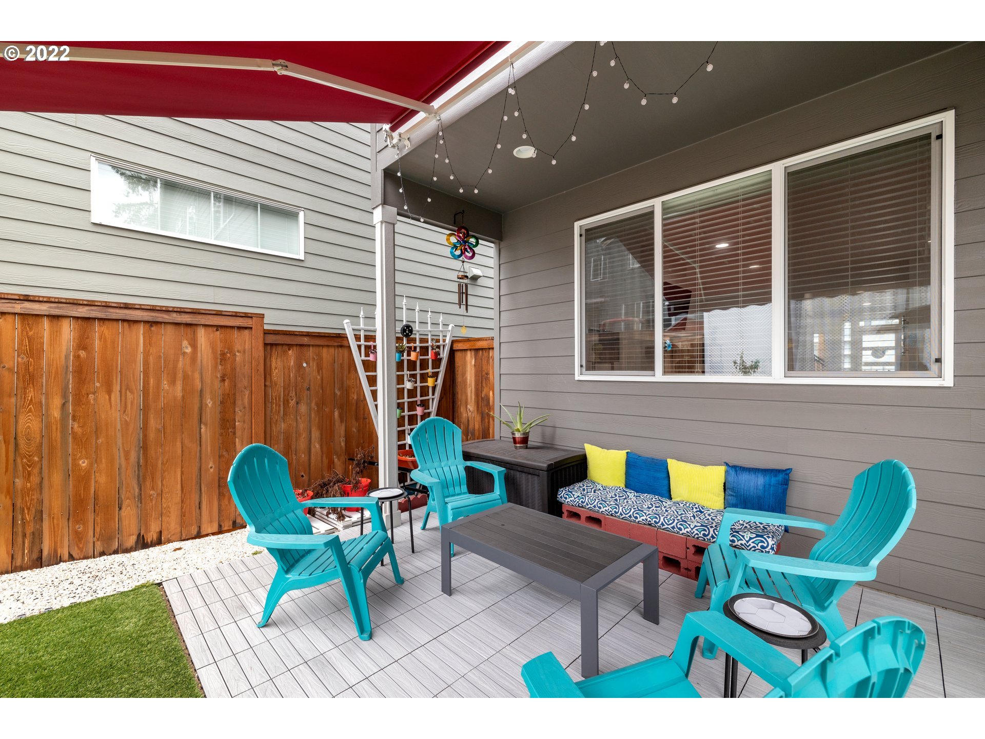 951 Southwest Draper Terrace Beaverton, OR 97003 - Photo 32 of 32 a balcony with furniture and a potted plant