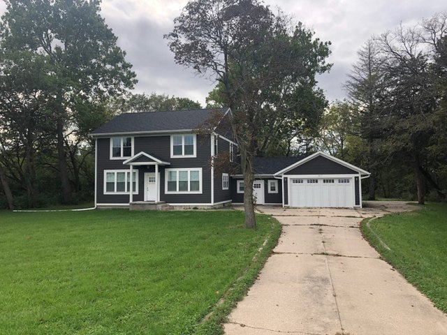 2517 East 275th Road Peru, IL 61354 - Photo 15 of 15 a front view of a house with a yard and trees