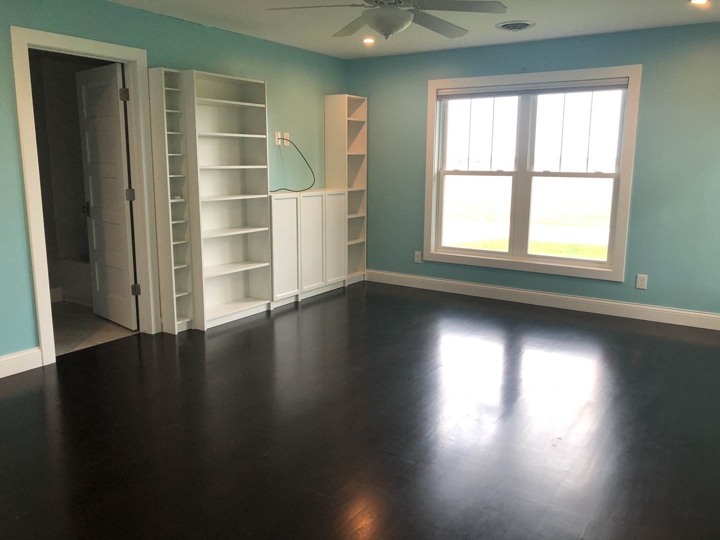 2517 East 275th Road Peru, IL 61354 - Photo 6 of 15 an empty room with wooden floor and windows