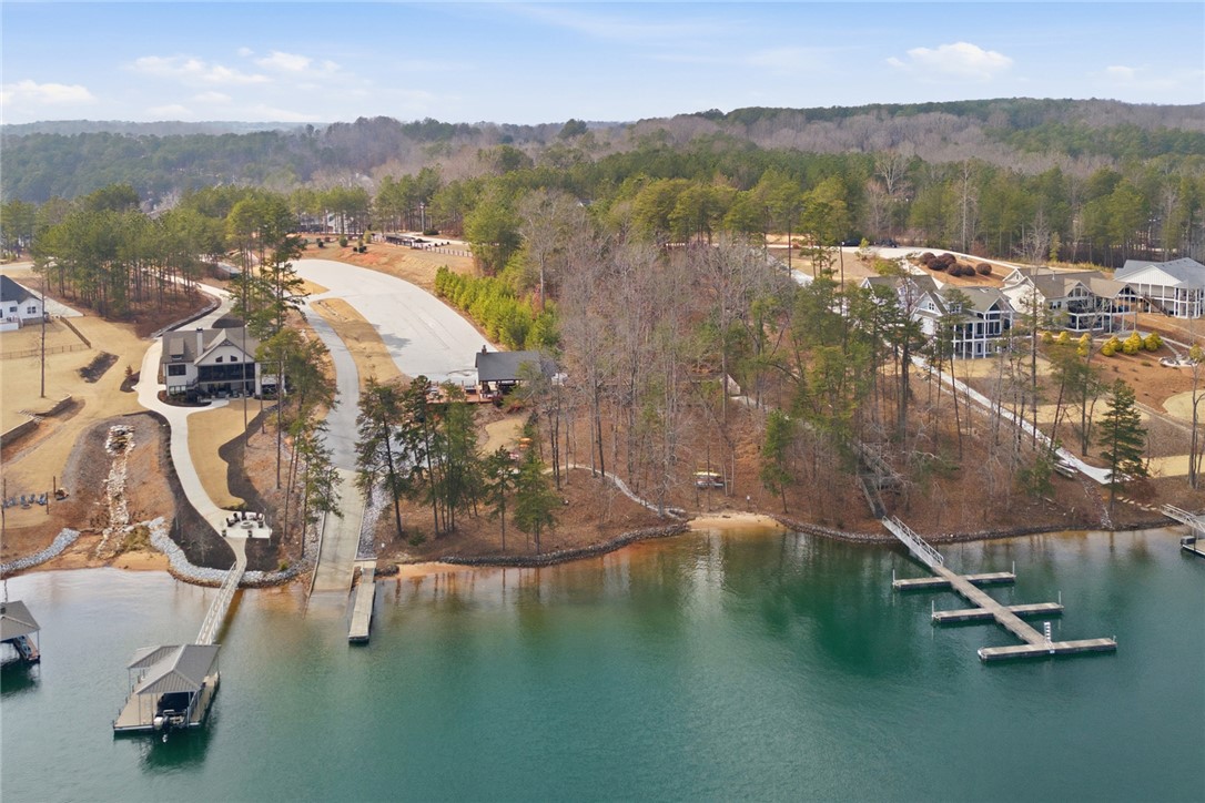 147 McAlister Road West Union, SC 29696 - Photo 43 of 49 This aerial view showcases a picturesque waterfront community with boat slips to rent for Lake Keowee access.