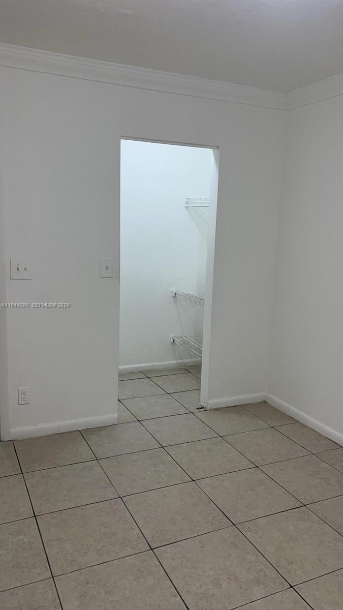 1802 Waterview Circle, Unit 1802 Palm Springs, FL 33461 - Photo 11 of 20 an empty room with white door