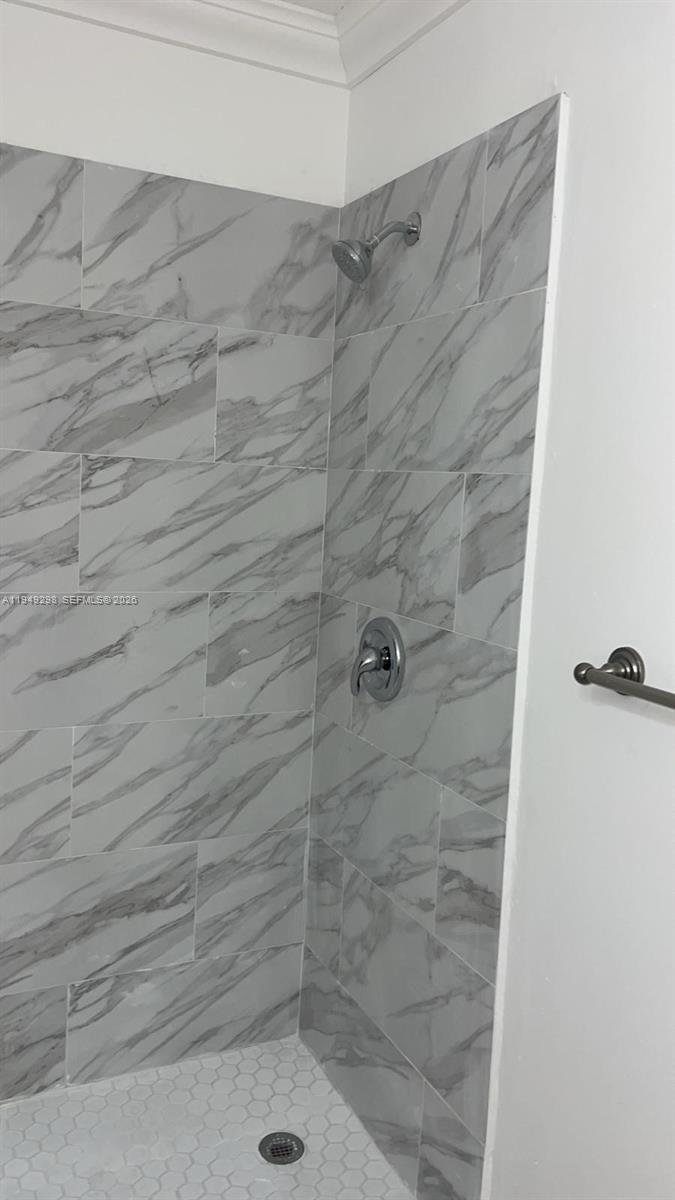 1802 Waterview Circle, Unit 1802 Palm Springs, FL 33461 - Photo 9 of 20 a bathroom with a shower