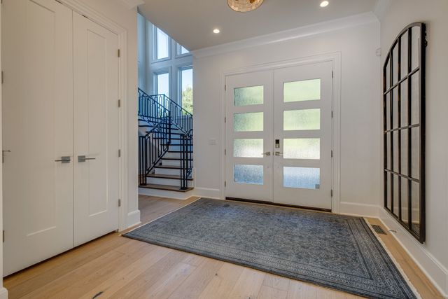a view of a hallway with staircase
