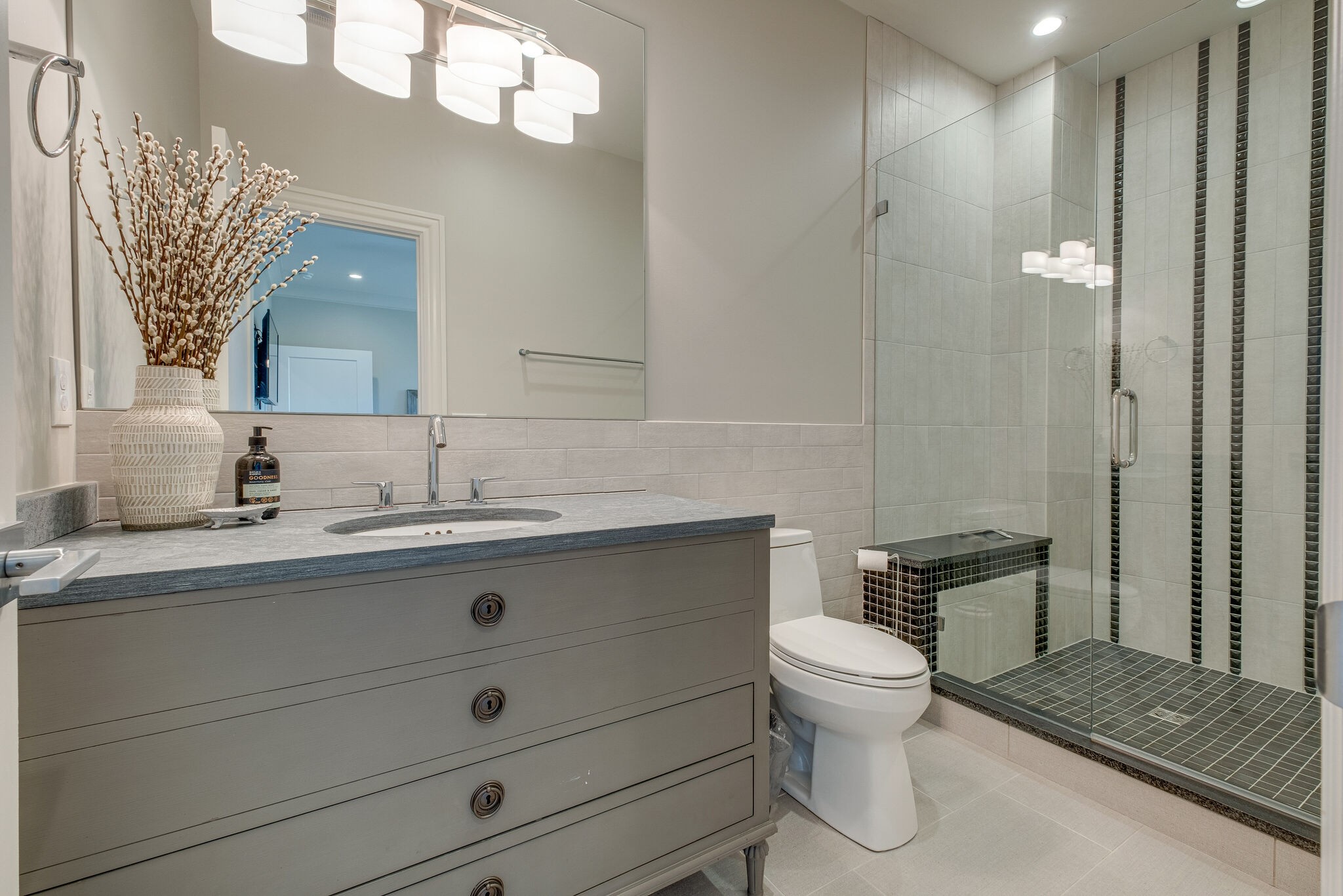 3500 Stokesmont Road Nashville, TN 37215 - Photo 46 of 75 a bathroom with a sink a toilet and a mirror