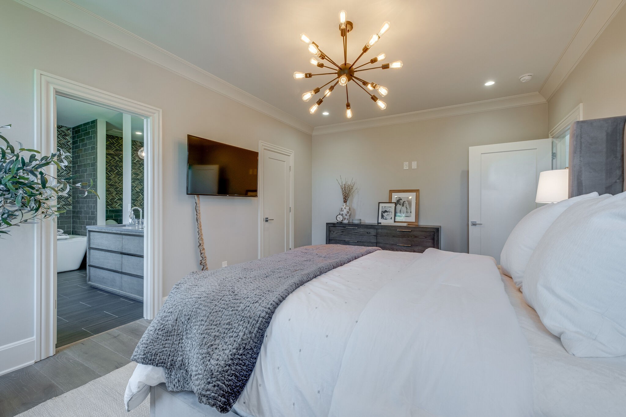 3500 Stokesmont Road Nashville, TN 37215 - Photo 48 of 75 a bedroom with a bed and a flat screen tv