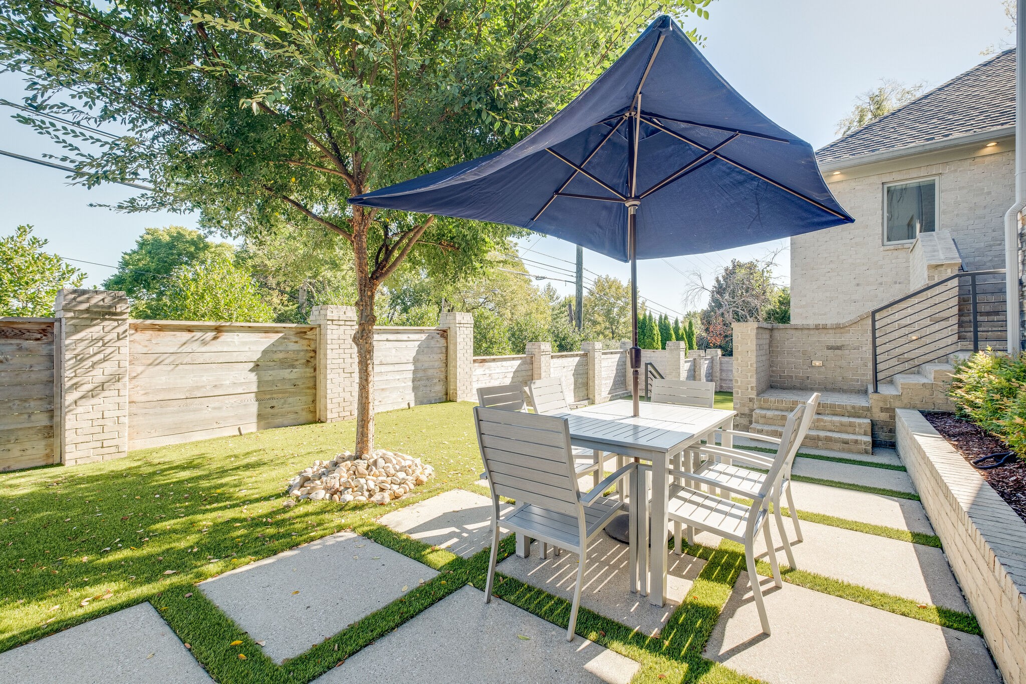 3500 Stokesmont Road Nashville, TN 37215 - Photo 59 of 75 a view of patio with table and chairs under an umbrella