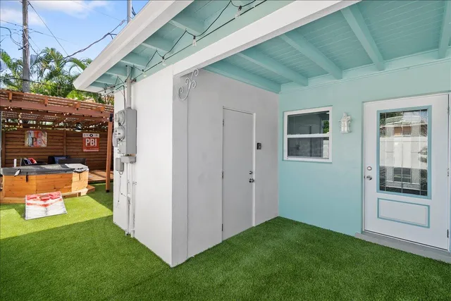 a backyard of a house with seating space