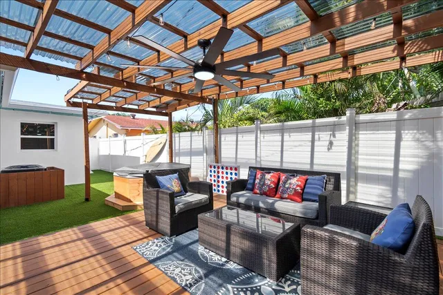 a outdoor living space with patio furniture and a garden