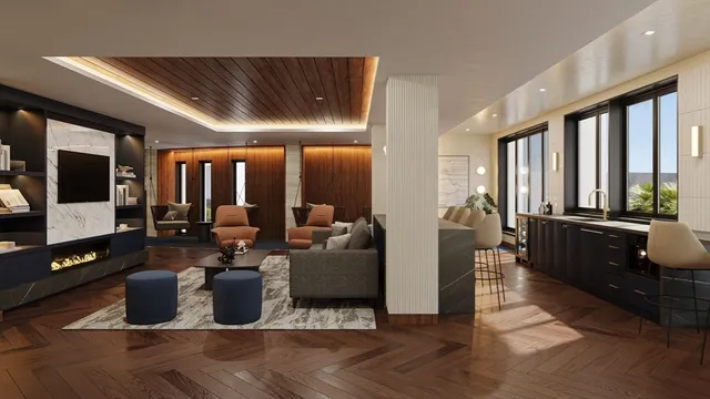 a living room with large couches and a flat screen tv