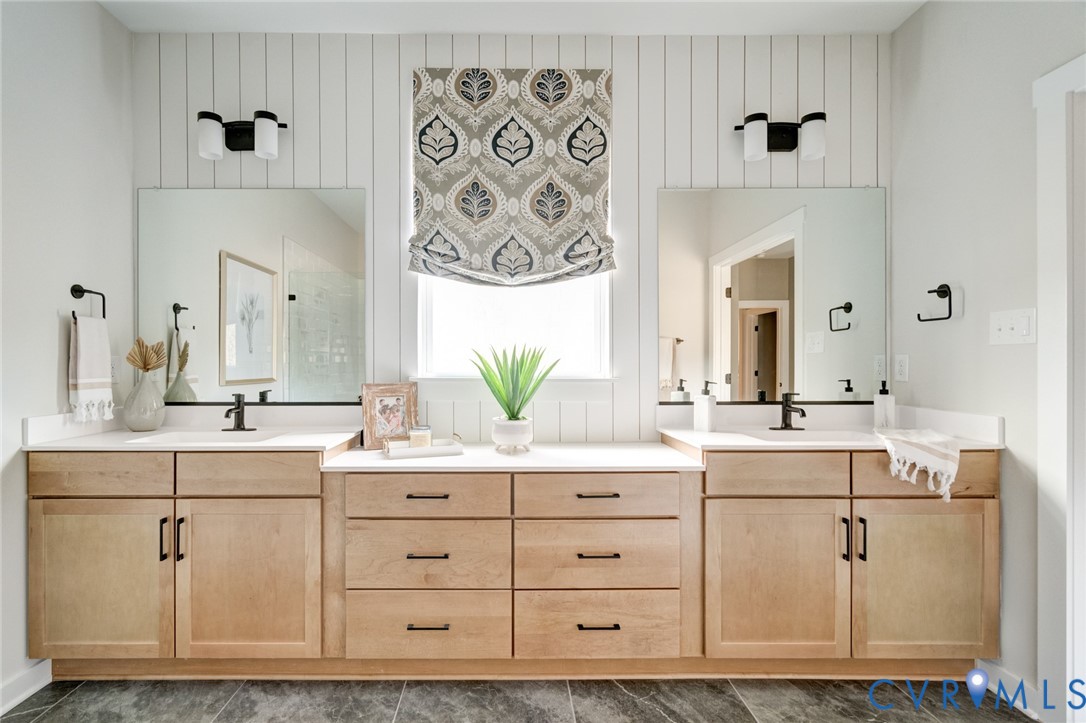 16000 Canoe Pointe Loop Moseley, VA 23120 - Photo 5 of 11 a spacious bathroom with a double vanity sink a mirror a bathtub and