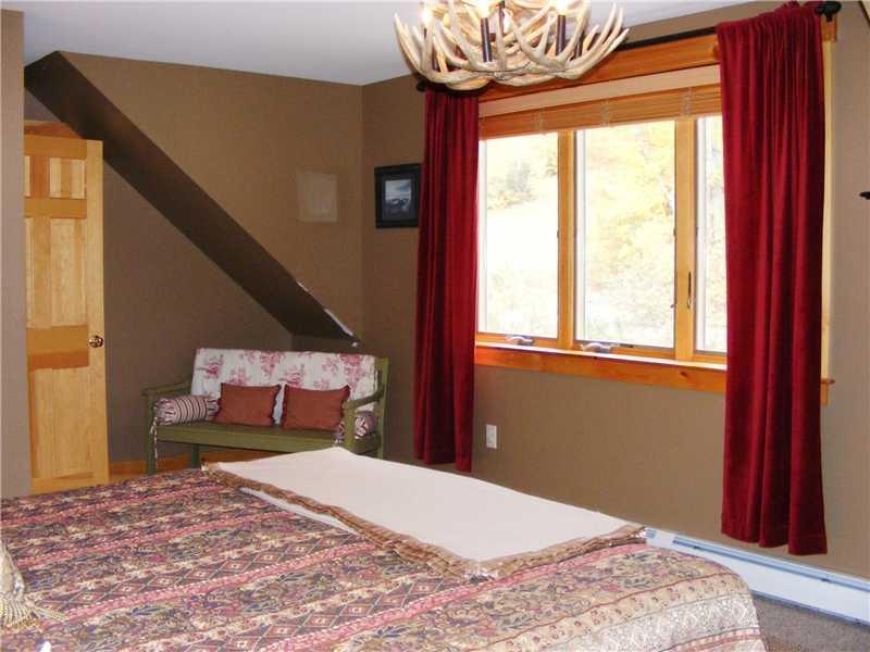 7017 Hardwood Ridge Road, Unit 7017 Kingfield, ME 04947 - Photo 16 of 29 Master Bedroom.