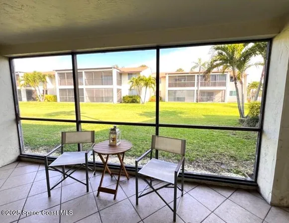 a view of a room with lounge chairs