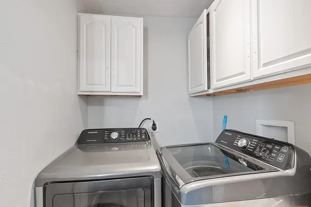 a workspace with furniture and a window