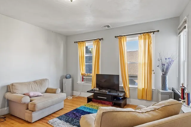 a kitchen with a stove and cabinets