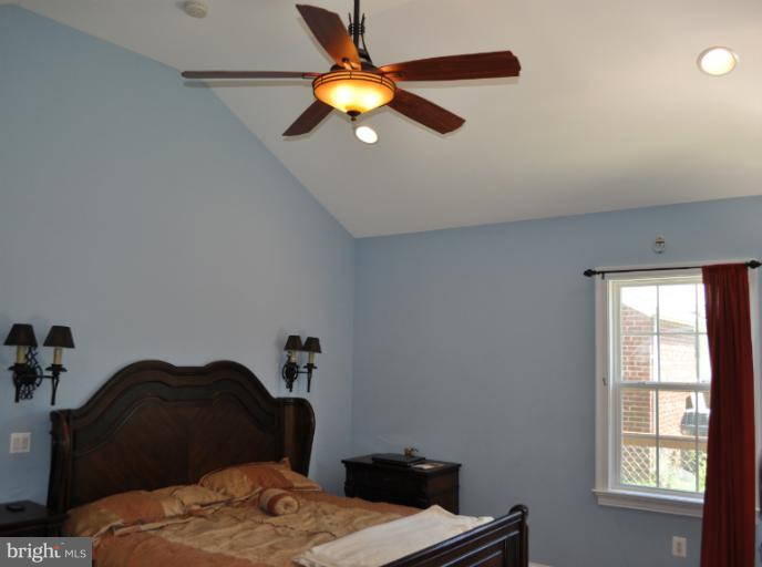 2916 Weisman Road Silver Spring, MD 20902 - Photo 12 of 19 a bedroom with a bed and a window