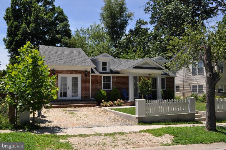 2916 Weisman Road Silver Spring, MD 20902 - Photo 19 of 19 a view of a house with a yard and tree s