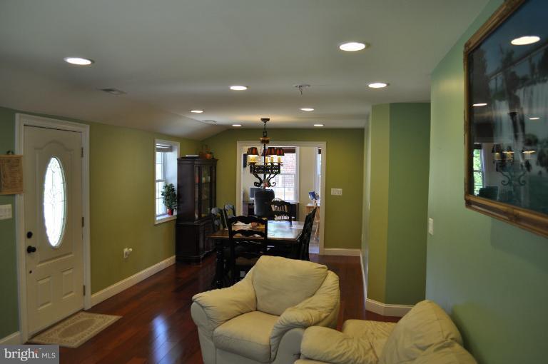 2916 Weisman Road Silver Spring, MD 20902 - Photo 3 of 19 a living room with furniture and wooden floor