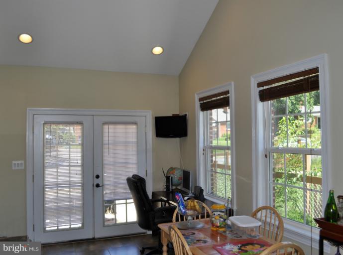 2916 Weisman Road Silver Spring, MD 20902 - Photo 6 of 19 a view of a livingroom with workspace and a window
