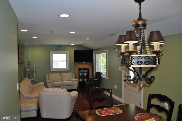2916 Weisman Road Silver Spring, MD 20902 - Photo 10 of 19 a living room with furniture and a window