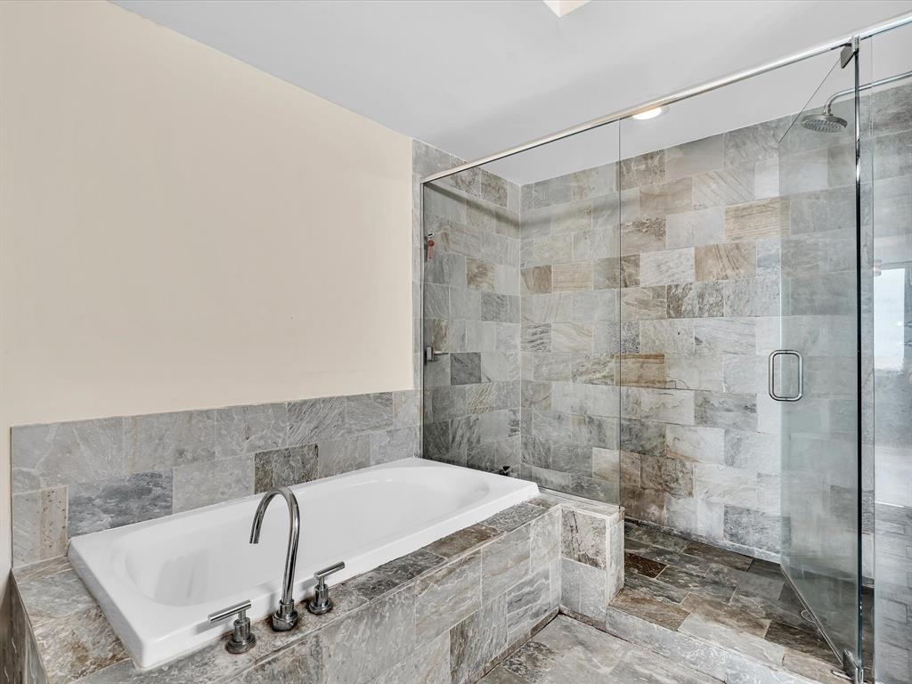 2681 North Flamingo Road, Unit 2104S Fort Lauderdale, FL 33323 - Photo 43 of 99 a bathroom with a bathtub and shower