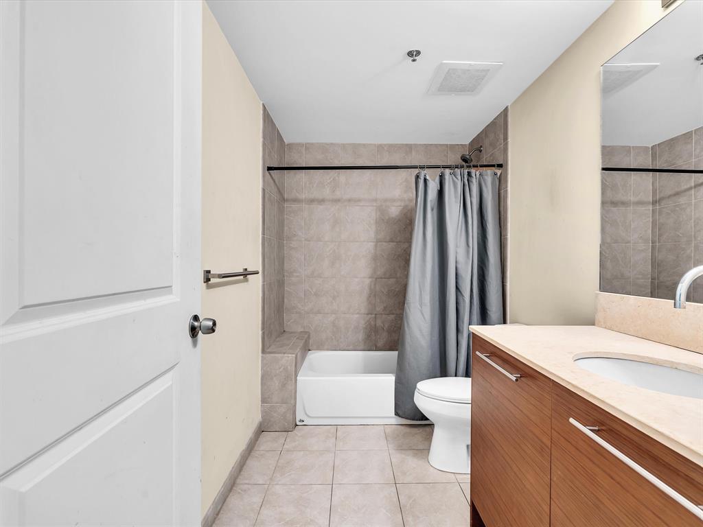 2681 North Flamingo Road, Unit 2104S Fort Lauderdale, FL 33323 - Photo 51 of 99 a bathroom with a sink a toilet a tub and shower