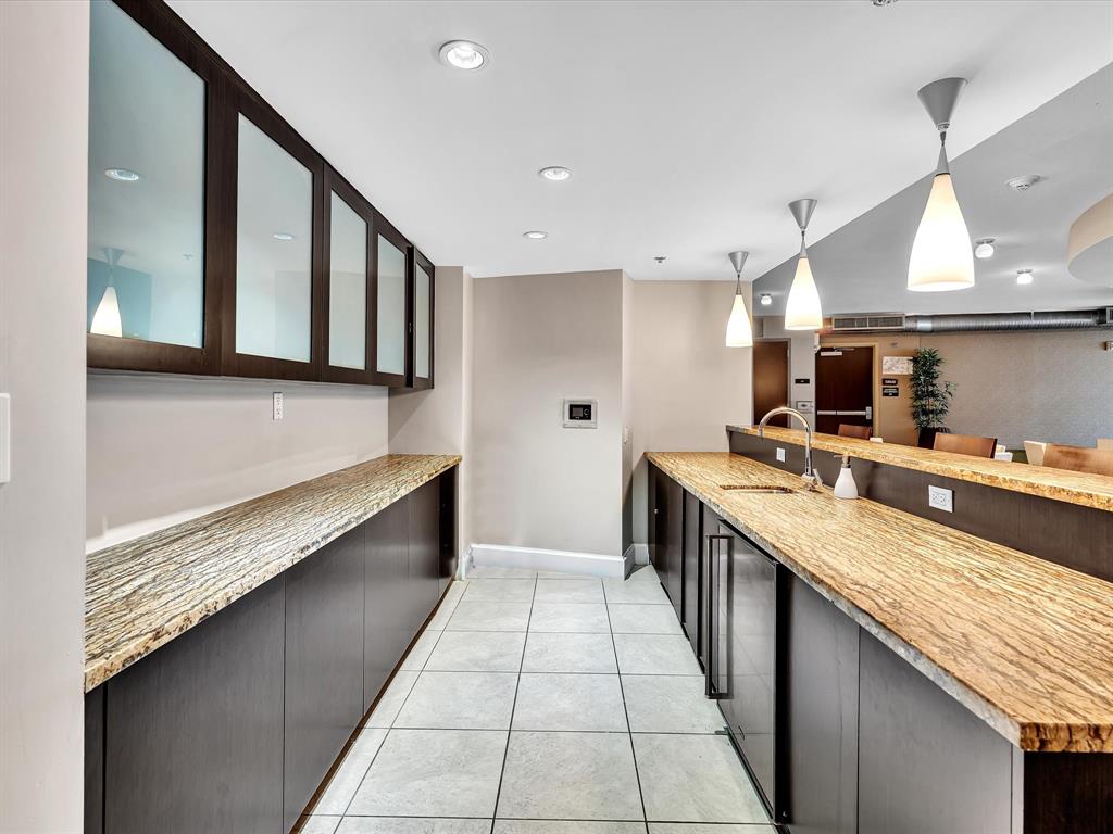 2681 North Flamingo Road, Unit 2104S Fort Lauderdale, FL 33323 - Photo 82 of 99 a large kitchen with stainless steel appliances granite countertop a large counter top