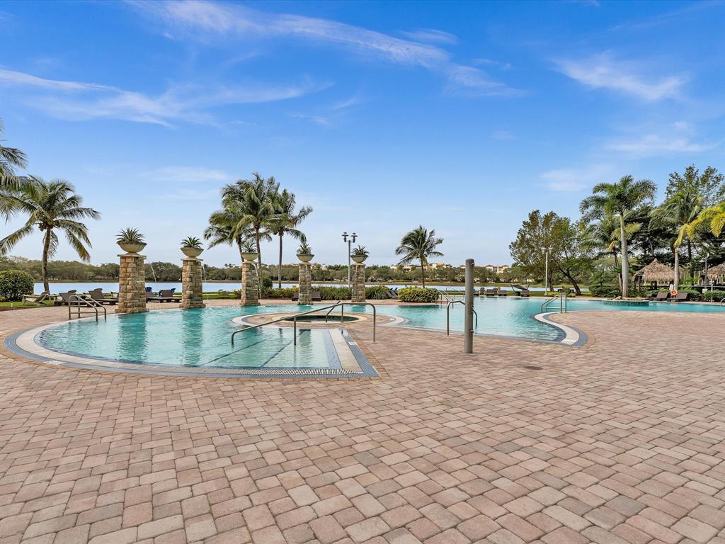 2681 North Flamingo Road, Unit 2104S Fort Lauderdale, FL 33323 - Photo 84 of 99 a view of a swimming pool with a yard