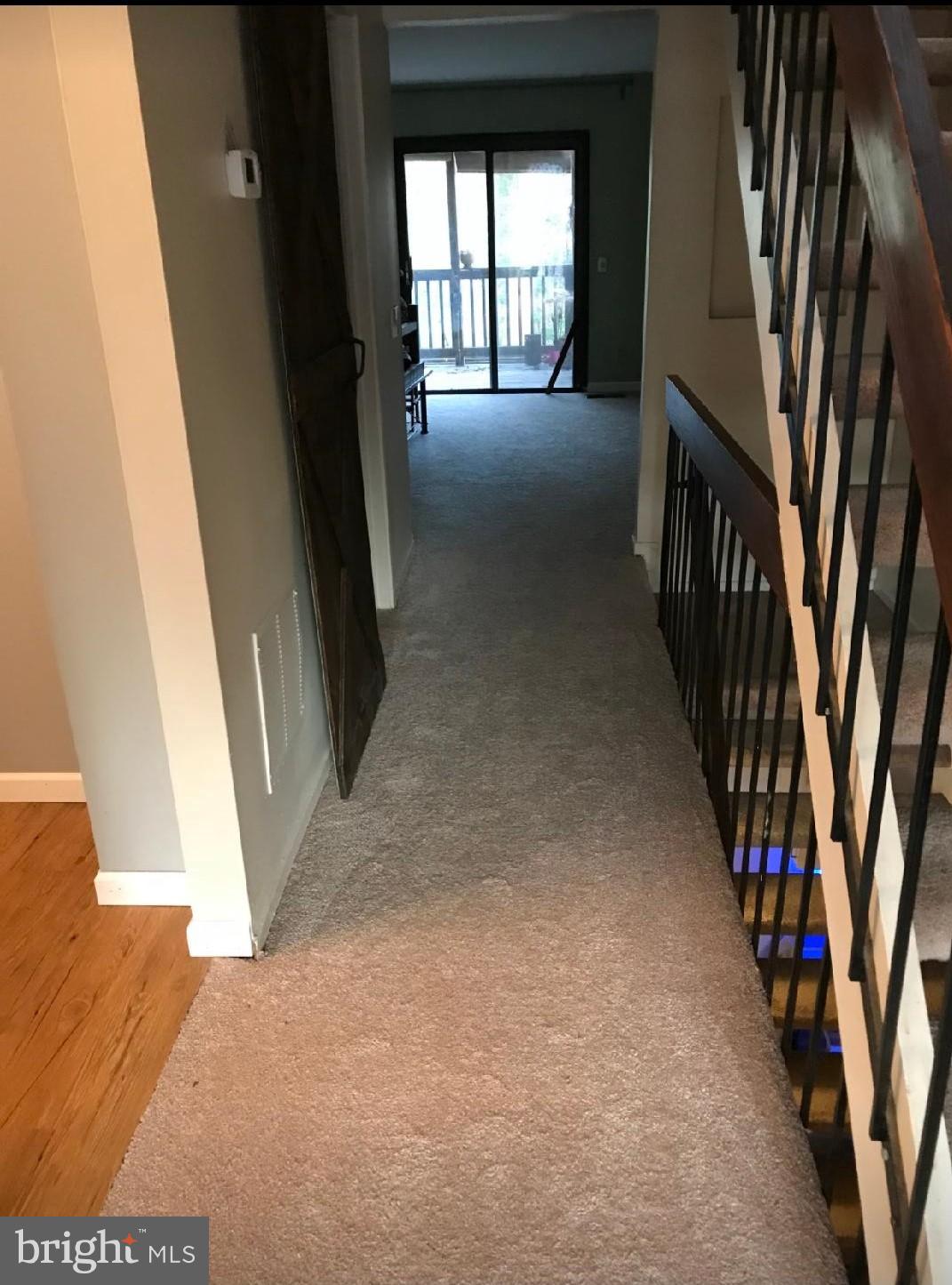 2261 Wheelwright Court Reston, VA 20191 - Photo 5 of 13 Hallway stairs and entrance to living room