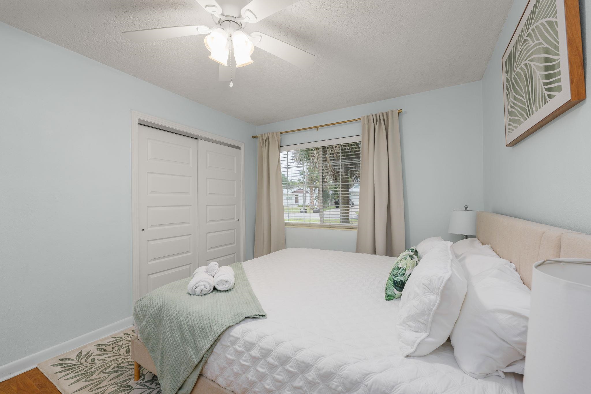 119 Menendez Road St. Augustine, FL 32080 - Photo 18 of 40 a bedroom with a bed and a window
