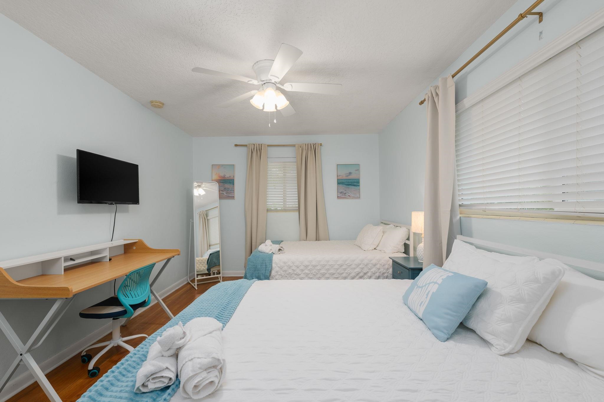 119 Menendez Road St. Augustine, FL 32080 - Photo 22 of 40 a bedroom with a bed and a flat screen tv
