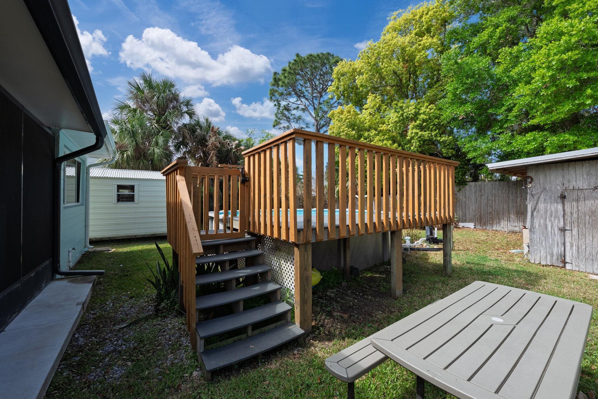 119 Menendez Road St. Augustine, FL 32080 - Photo 38 of 40 a view of a backyard with sitting area