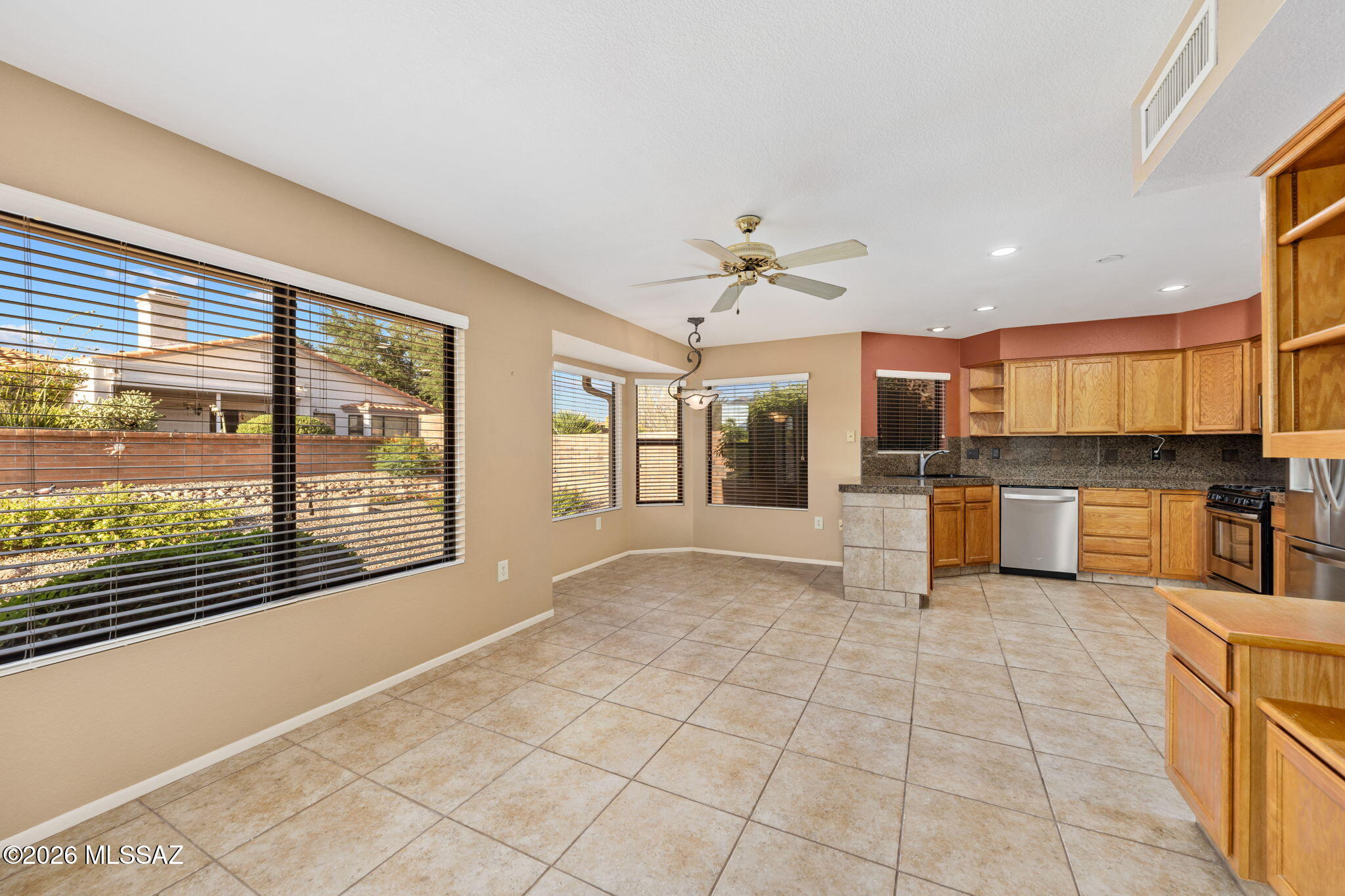 1029 East Rising Sun Drive Oro Valley, AZ 85755 - Photo 11 of 51 FAMILY ROOM & KITCHEN