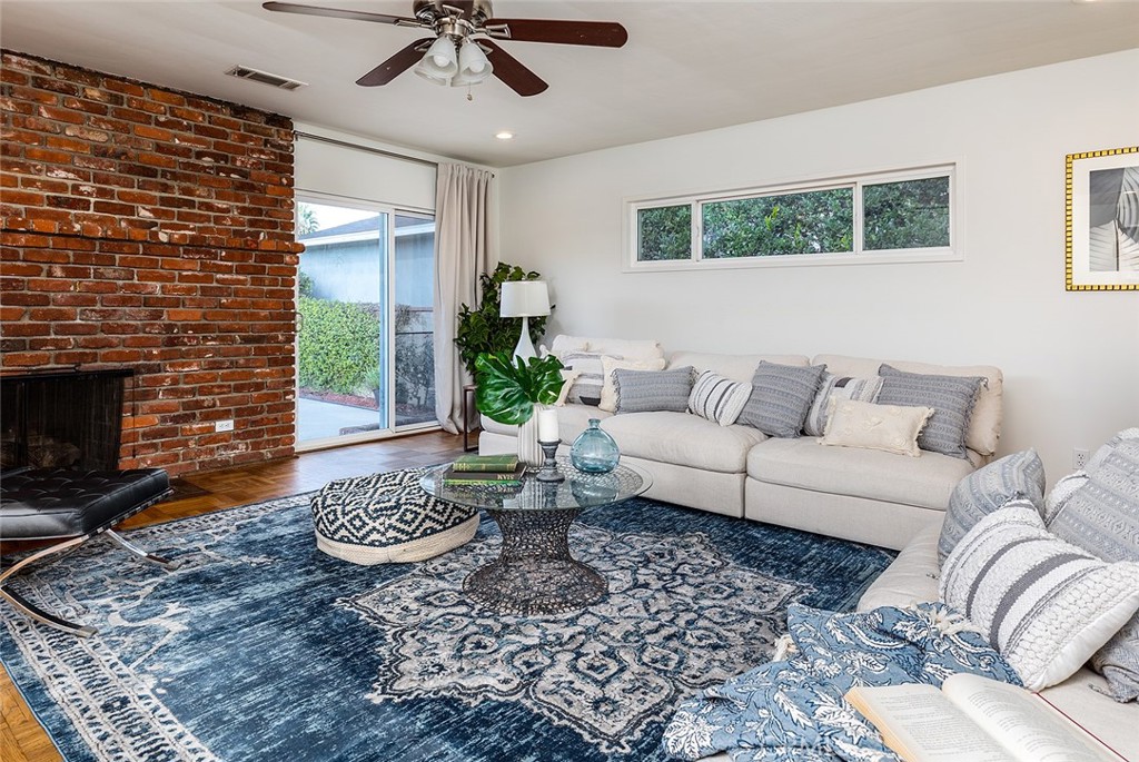 5343 Marshburn Avenue Arcadia, CA 91006 - Photo 12 of 25 a living room with furniture and a fireplace
