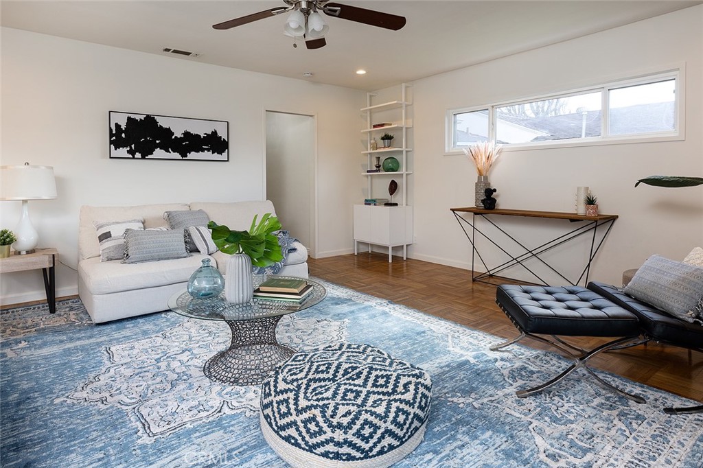 5343 Marshburn Avenue Arcadia, CA 91006 - Photo 13 of 25 a living room with furniture a rug and a window