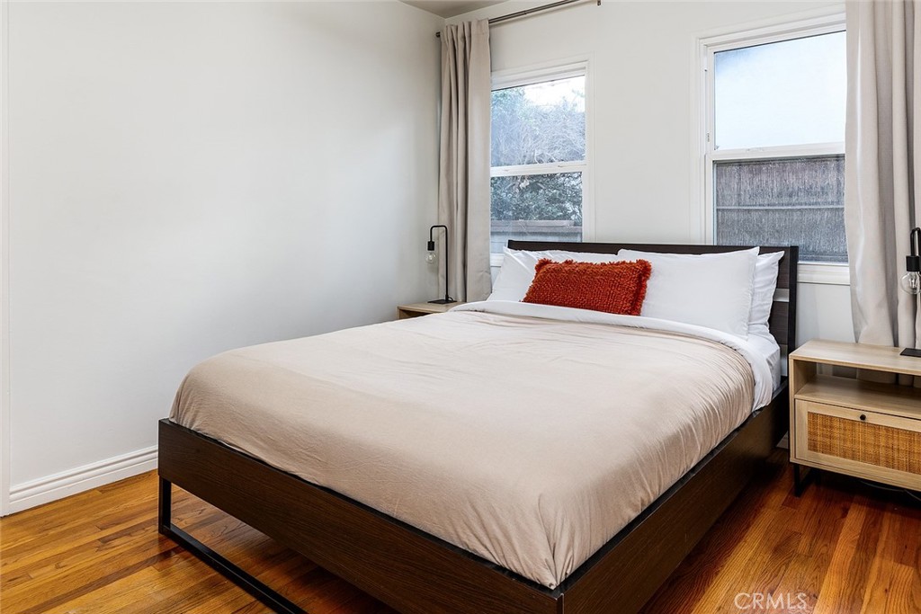 5343 Marshburn Avenue Arcadia, CA 91006 - Photo 14 of 25 a large bed sitting in a bedroom next to a window