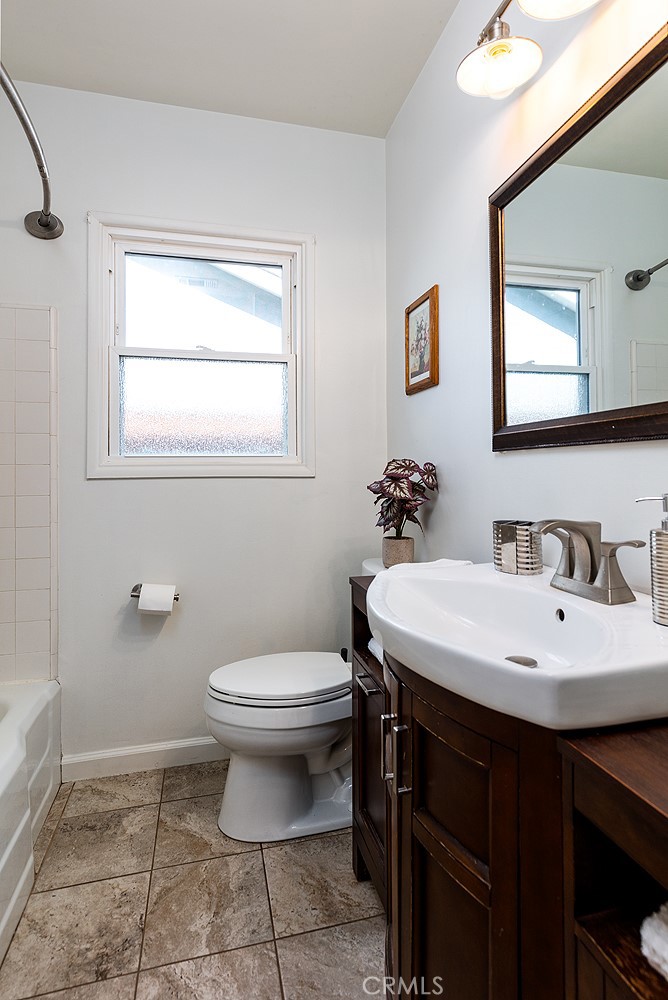 5343 Marshburn Avenue Arcadia, CA 91006 - Photo 16 of 25 a bathroom with a sink toilet and a mirror