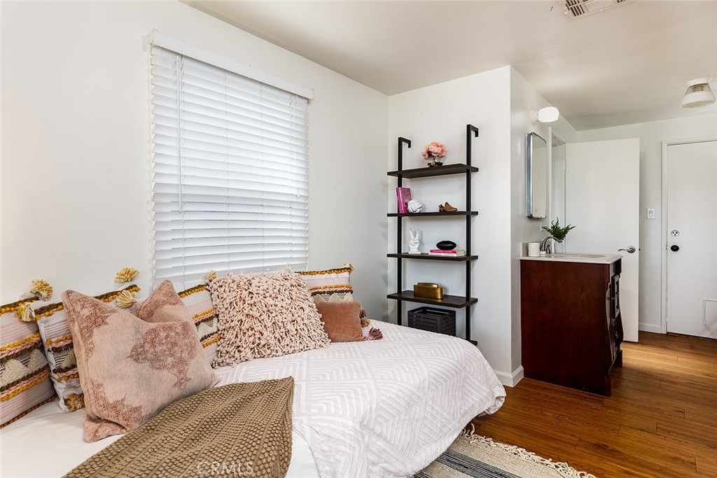 5343 Marshburn Avenue Arcadia, CA 91006 - Photo 19 of 25 a bedroom with a bed and a cabinets