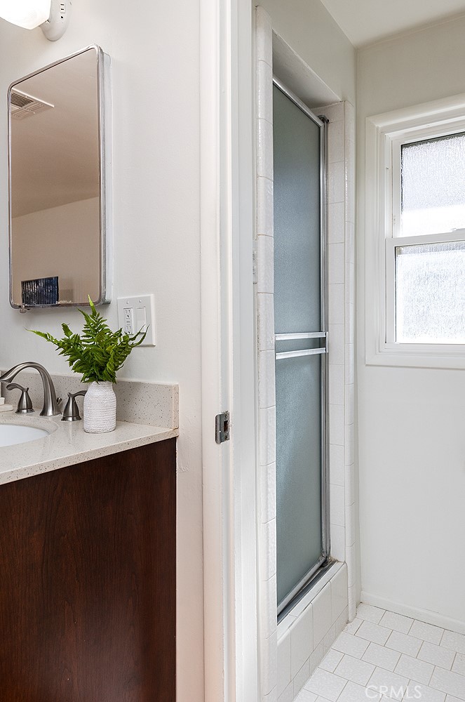 5343 Marshburn Avenue Arcadia, CA 91006 - Photo 21 of 25 a room with a sink and mirror