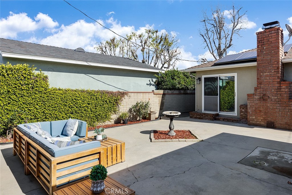 5343 Marshburn Avenue Arcadia, CA 91006 - Photo 22 of 25 a view of a patio with couches table and chairs and potted plants