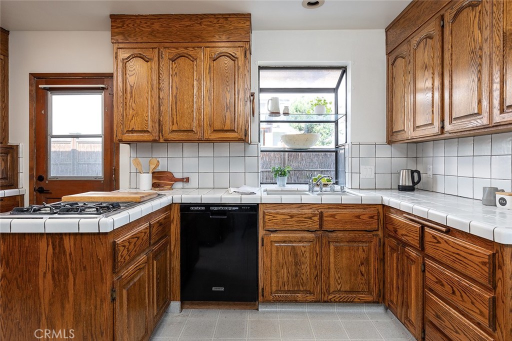 5343 Marshburn Avenue Arcadia, CA 91006 - Photo 8 of 25 a kitchen with stainless steel appliances granite countertop a sink stove and cabinets