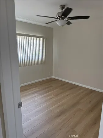 a view of a room that has a window in it