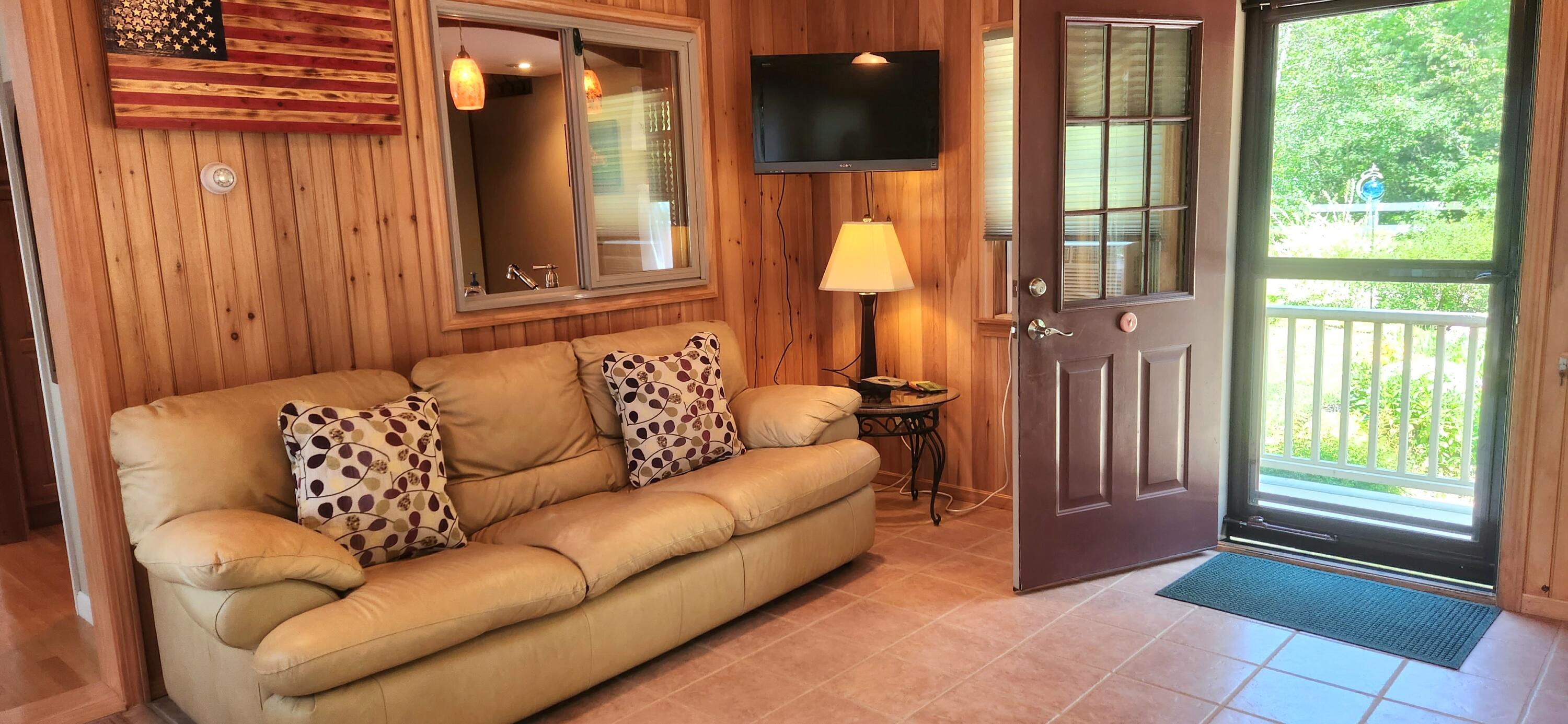 25 Siddall Road Sanford, ME 04073 - Photo 18 of 38 Sunroom leads to the spacious back deck